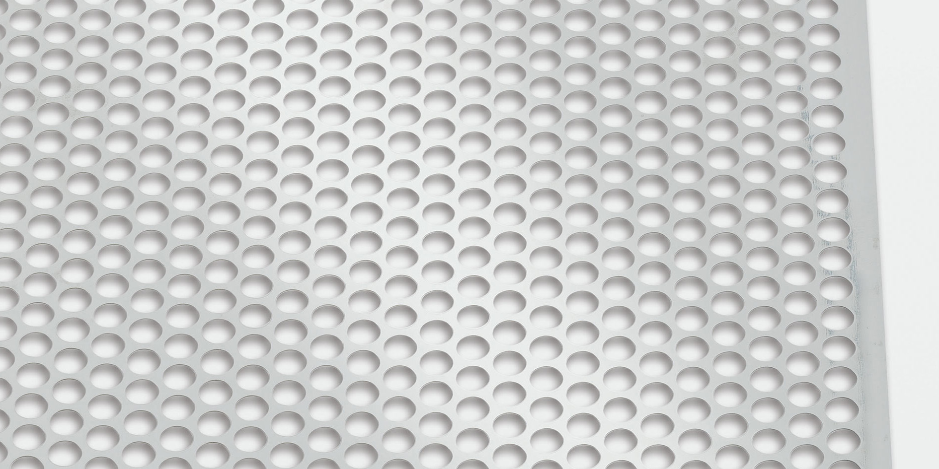 Sheet with round perforations